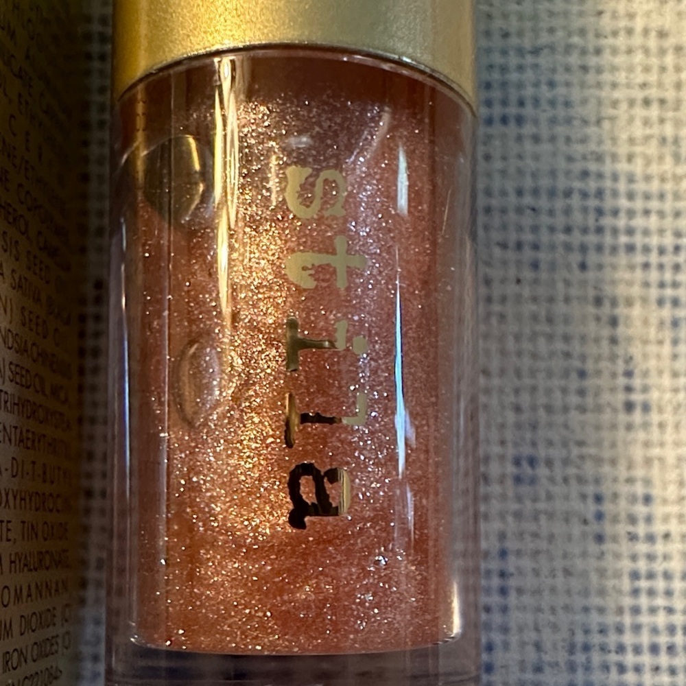 Stila Heaven's Dew Gel Lip Oil in color Kitten Komet.